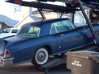 Unloading the Mark II at its final destination: Car hadn't run in about 6 years