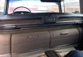 View from the rear seat: The rear dash with clock and jump seats define elegance